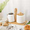 Набор из 2 фарфоровых банок с ложками на бамбуковой подставке «Герда»